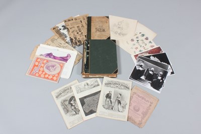 Lot 143 - A group of books, fashion plates, photographs...