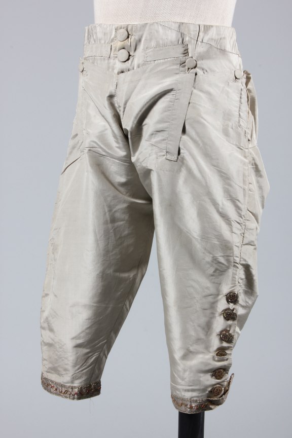 Lot 150 - A pair of pale grey silk breeches, circa