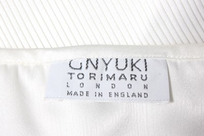 Lot 20 - A group of Yuki ivory and white pleated...