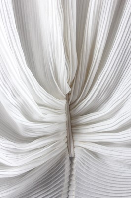 Lot 20 - A group of Yuki ivory and white pleated...