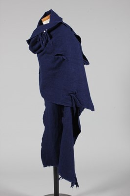 Lot 174 - A Comme des Garcons slashed and distressed...