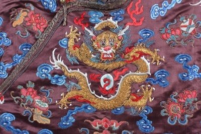 Lot 182 - A boy's chestnut satin embroidered dragon robe,...