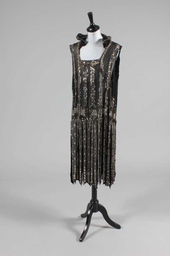 Lot 188 - A sequined and fringed flapper dress, late...