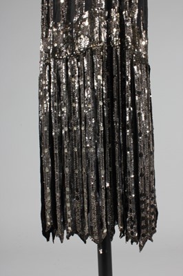 Lot 188 - A sequined and fringed flapper dress, late...