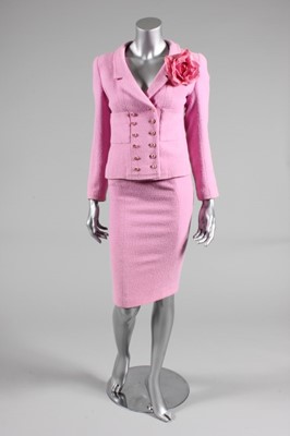 Lot 206 - A Chanel pale pink bouclé wool suit, late...