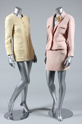 Lot 207 - A Chanel pink tweed suit, 1980s, boutique...