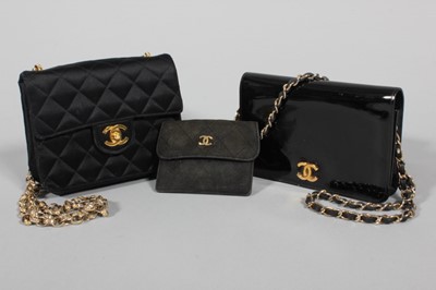 Lot 216 - A Chanel quilted satin evening bag, 1980s,...