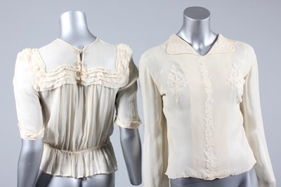 Lot 28 - Two ivory chiffon blouses, 1930s, together...