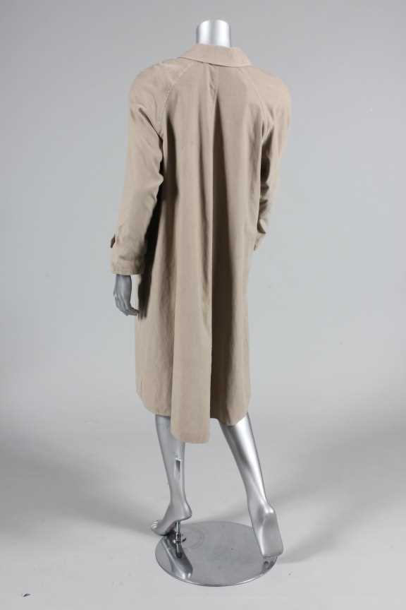 Lot 253 - The 1980s beige raincoat worn by Meryl