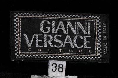 Lot 53 - A Gianni Versace flocked velvet ensemble,...