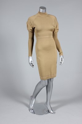 Lot 283 - An Azzedine Alaia camel knitted wool dress,...