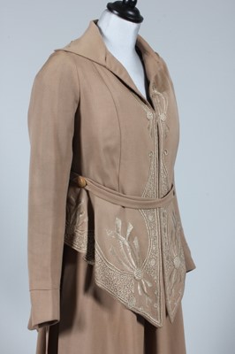 Lot 33 - An embroidered brown wool walking suit, circa...
