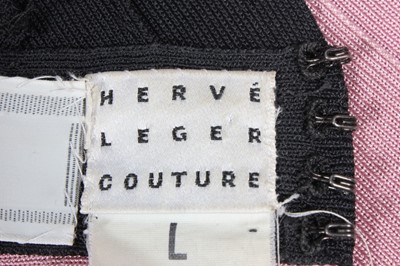 Lot 309 - An Herve Leger pink and black `bandage' dress,...
