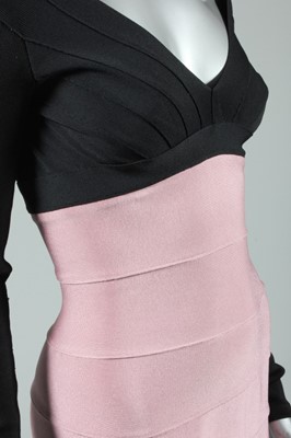 Lot 309 - An Herve Leger pink and black `bandage' dress,...