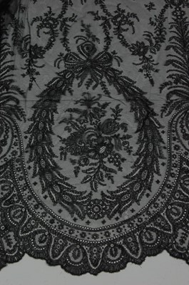Lot 7 - Black lace, comprising: a Chantilly bobbin...