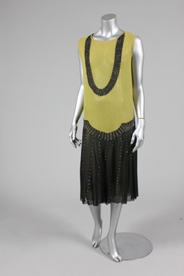 Lot 357 - A chartreuse and black chiffon flapper dress,...