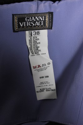 Lot 359 - A Versace black mohair cocktail dress, 1990s,...