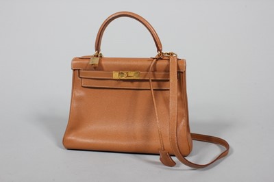 Lot 381 - An Hermès tan leather Kelly, circa 1999, blind...