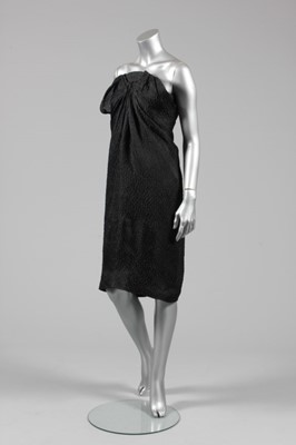 Lot 57 - A Balenciaga couture black cloqu satin...