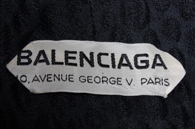 Lot 57 - A Balenciaga couture black cloqu satin...