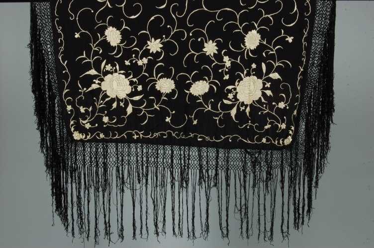 Lot 35 - Three embroidered black silk shawls, Cantonese,...