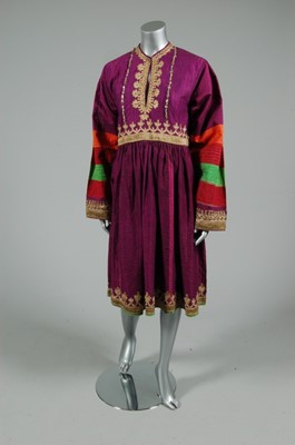Lot 70 - Two Afghan dresses, one of purple silk with...