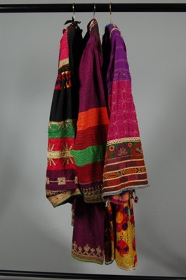 Lot 70 - Two Afghan dresses, one of purple silk with...