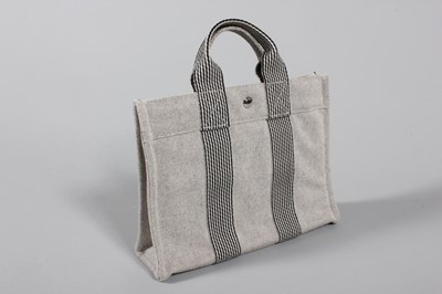 Lot 54 - Two Hermès hoppers, one grey, the other brown...
