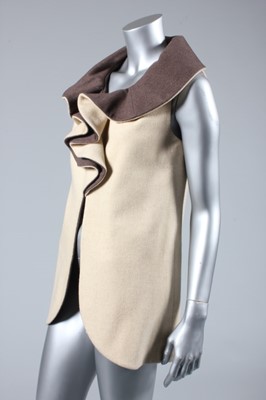 Lot 18 - A Yuki beige and brown wool waistcoat,...