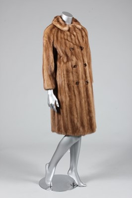 Lot 74 - A light brown mink coat, 1970s, labelled...
