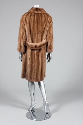 Lot 74 - A light brown mink coat, 1970s, labelled...