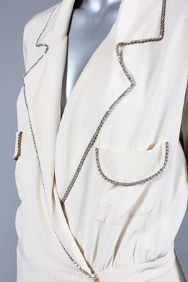 Lot 75 - A Chanel ivory crepe de chine evening gown,...