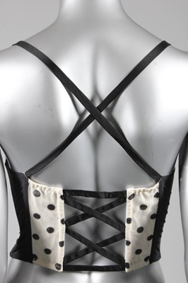 Lot 81 - A Christian Dior boutique polka dot corset...