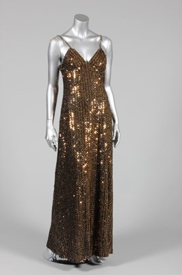 Lot 97 - A Biba gold sequined evening gown, early 1970s,...