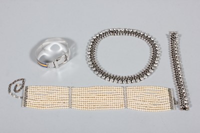 Lot 104 - A Butler & Wilson white metal chain and bead...