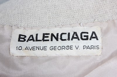 Lot 107 - A Balenciaga couture grey wool jersey suit,...