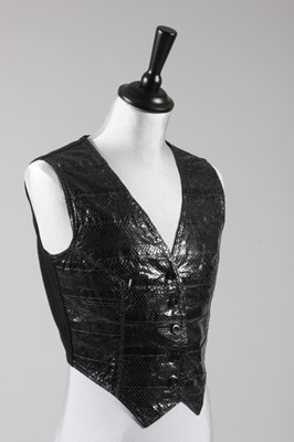 Lot 110 - An Ossie Clark black snakeskin waistcoat, late...