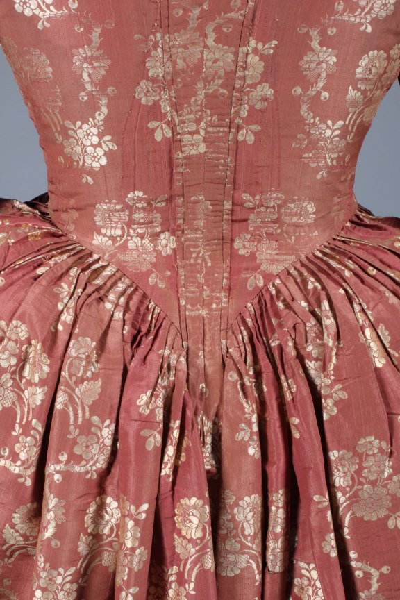 Lot 26 - A brocaded silk open robe and petticoat,
