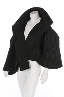 Lot 196 - A John Galliano over-sized black moiré jacket,...