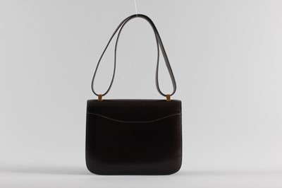 Lot 17 - An Hermès 'Constance' chocolate brown leather...