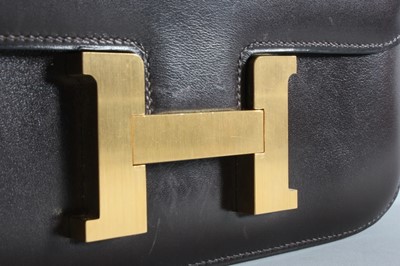 Lot 17 - An Hermès 'Constance' chocolate brown leather...