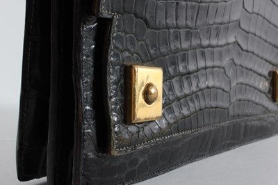 Lot 8 - An Hermès black crocodile `Piano' handbag,...