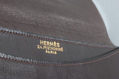 Lot 13 - An Hermès brown leather art-deco clutch bag,...