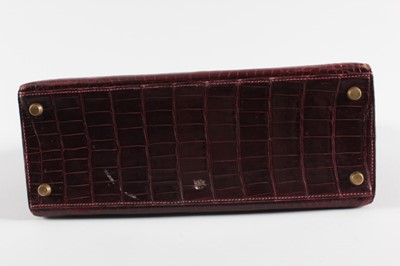 Lot 5 - An Hermès wine crocodile Kelly bag, circa 1964,...