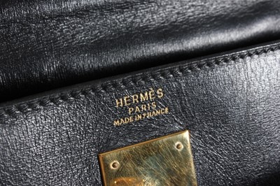 Lot 1 - An Hermès black leather Kelly bag, 1991, blind...
