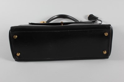 Lot 1 - An Hermès black leather Kelly bag, 1991, blind...