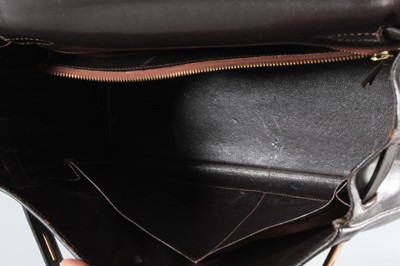 Lot 16 - An Hermès chocolate brown leather Kelly bag,...
