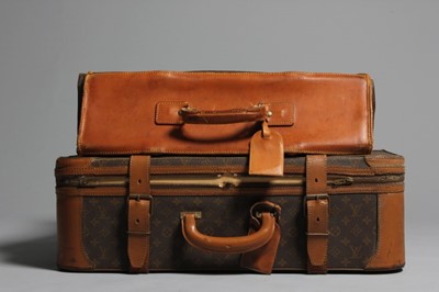Lot 2 - A Louis Vuitton soft sided suitcase and suit...