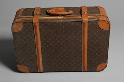 Lot 2 - A Louis Vuitton soft sided suitcase and suit...