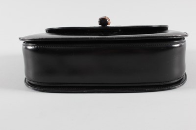 Lot 3 - A Gucci black leather 'bamboo' handbag, 1960s,...